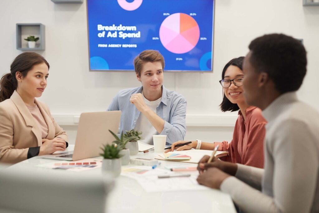 young-people-discussing-marketing-in-meeting-DUKKGYJ.jpg